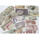A small collection of World bank notes, including two Peppiatt 10 shillings, one purple and one red,