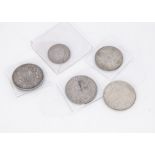 Five British coins, including three half crowns, 1842, 1887 and 1916, an 1887 florin and a 1900