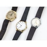 Three vintage manual wind wristwatches, including a Cyma Triplex, 33mm stainless steel case, a Ruhla