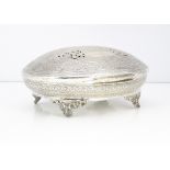 A c1970s century Egyptian white oval box, 30.7 ozt, and 25cm wide, with engraved and pierced