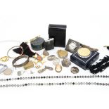A quantity of costume jewellery, including a textured silver bangle, various silver pendants,