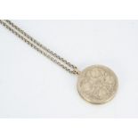 A 9ct gold circular floral engraved locket, on a circular linked chain, locket 3.3cm diameter, total