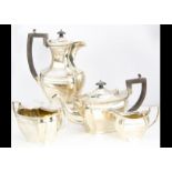 A four piece George V silver tea set by Charles Boynton & Son, 55.5 ozt, in the traditional taste,