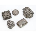 Five silver and white metal boxes and cases, including an Indian heart shaped box with elephant, a