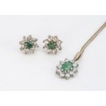 An emerald and cubic zirconia cluster pendant, together with a pair of matching ear studs,