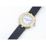 A c1980s Must De Cartier lady's quartz wristwatch, 26mm with gilt bezel set with screws, white