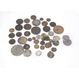 A collection of antique coins and tokens, including some Georgian copper tokens, four Tudor hammered