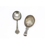 A Georgian period silver tea caddy spoon by L & Co, together with an Arts & Crafts period silver tea