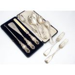 A set of six Victorian silver dessert spoons by George Adams, together with a pair of George Adams