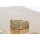 A 9ct gold gentleman's signet ring, of rectangular textured design, ring size P, 11.7g, in turquoise