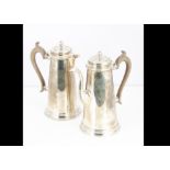 A 1960s silver coffee pot and hot water jug by K&P, 44 ozt, both plain conical tapered bodies with