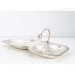 A c1970s Mexican white metal serving dish, 11.82 ozt, 31cm wide, double leaf design with handle,