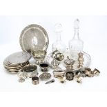 A collection of silver and silver plate, including a pair of metal mounted shell salts, a silver