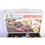 Scalextric C554 Super Speed 8 Set, comprising two C23 Arrows, one red, other green (both cars with