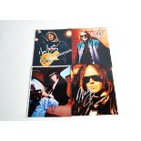 Neil Young / Signatures, four colour promotional photos of Neil Young, all with signatures - various