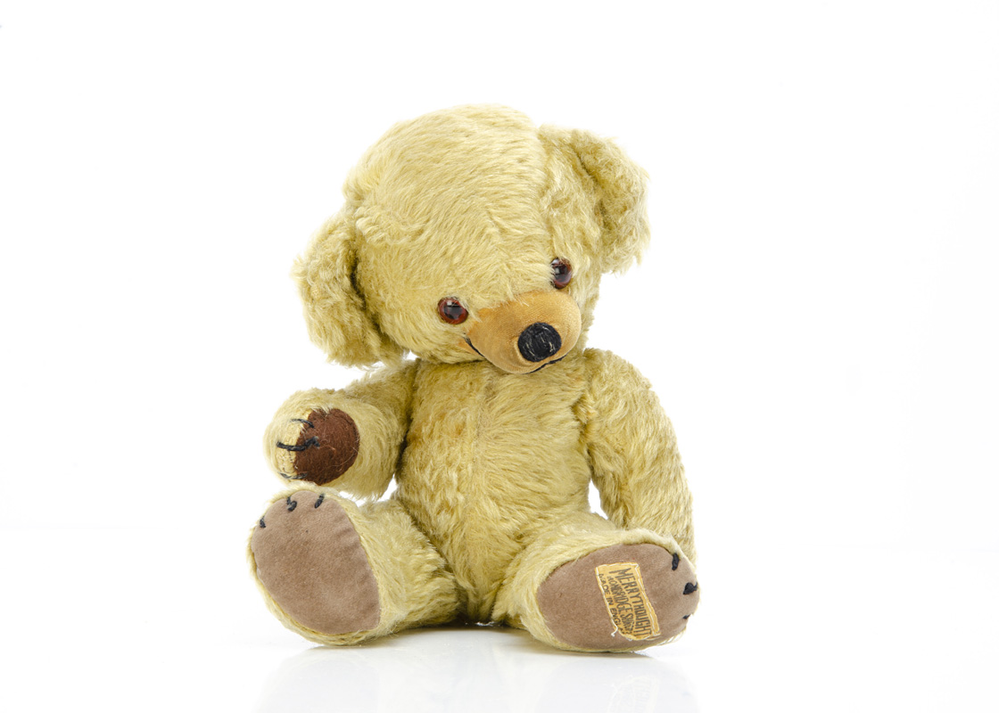 A 1960s Merrythought Cheeky teddy bear, with golden mohair, orange and black plastic eyes, inset
