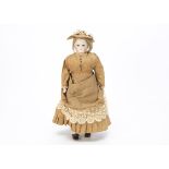 A German bisque shoulder-head fashionable doll, with fixed blue striated eyes, closed mouth, ears