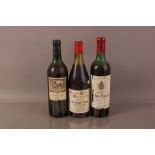 Three vintage bottles of French wine, inlcuding a 1971 Chateau Rocher Coutelin, a 1967 Chateau de