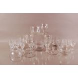 A collection of antique and modern glasses, including a rinsing bowl with Greek key etched design, a