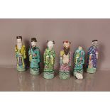 A set of six early 20th century Chinese stoneware polychrome glazed figures of elders and immortals,