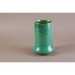 An early 20th century Ruskin Pottery high fired vase, 21cm, in green mottled glaze, stamped Ruskin