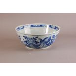 A large early 20th century Chinese blue and white porcelain bowl, 30.5cm diameter, with bird and