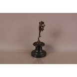 A Victorian period bronze figure of Mercury, on a circular black hardstone base, 21cm