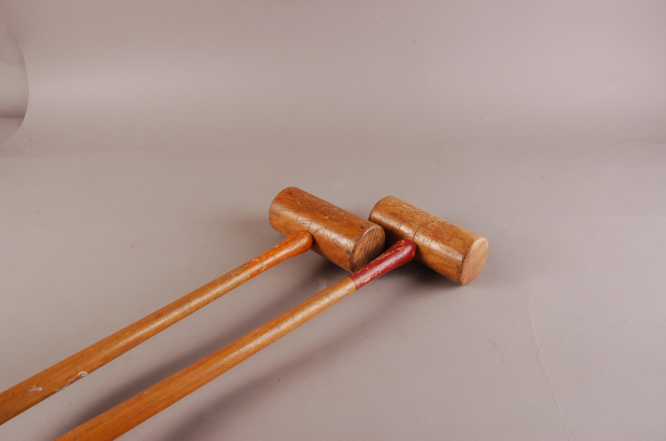 A vintage Croquet set, comprisng four mallets, four balls, six cast iron hoops, coloured centre - Image 3 of 3