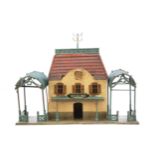 An early French-made Station by Faivre (FV) or similar, with central embossed-brick 2-storey