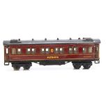 An uncommon Märklin 0 Gauge Mitropa Sleeping Car, approx 14" over buffers, in Mitropa cherry-red