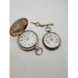 A silver cased full hunter pocket watch, with white enamel dial, Roman numerals and second