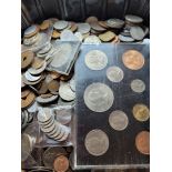 A large collection of loose coins, various countries and dates, including an ER II 1965 nine coin