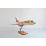 A model of an Easyjet aeroplane, with presentation plaque 'Presented to Richard Gooding for his