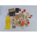 A quantity of vintage matchboxes and tins including Players, Embassy, Wills, etc