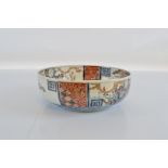 A large early 20th Century Japanese Meiji period ceramic bowl, with stamp to base decorated in blue,