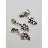 A Georg Jensen silver suite of jewels, comprising brooch and matching earrings all in grape and