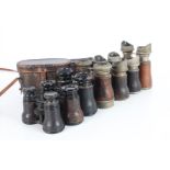 Seven Pairs of Field Glasses, four pairs of aluminium construction, three with shaped eyecups,