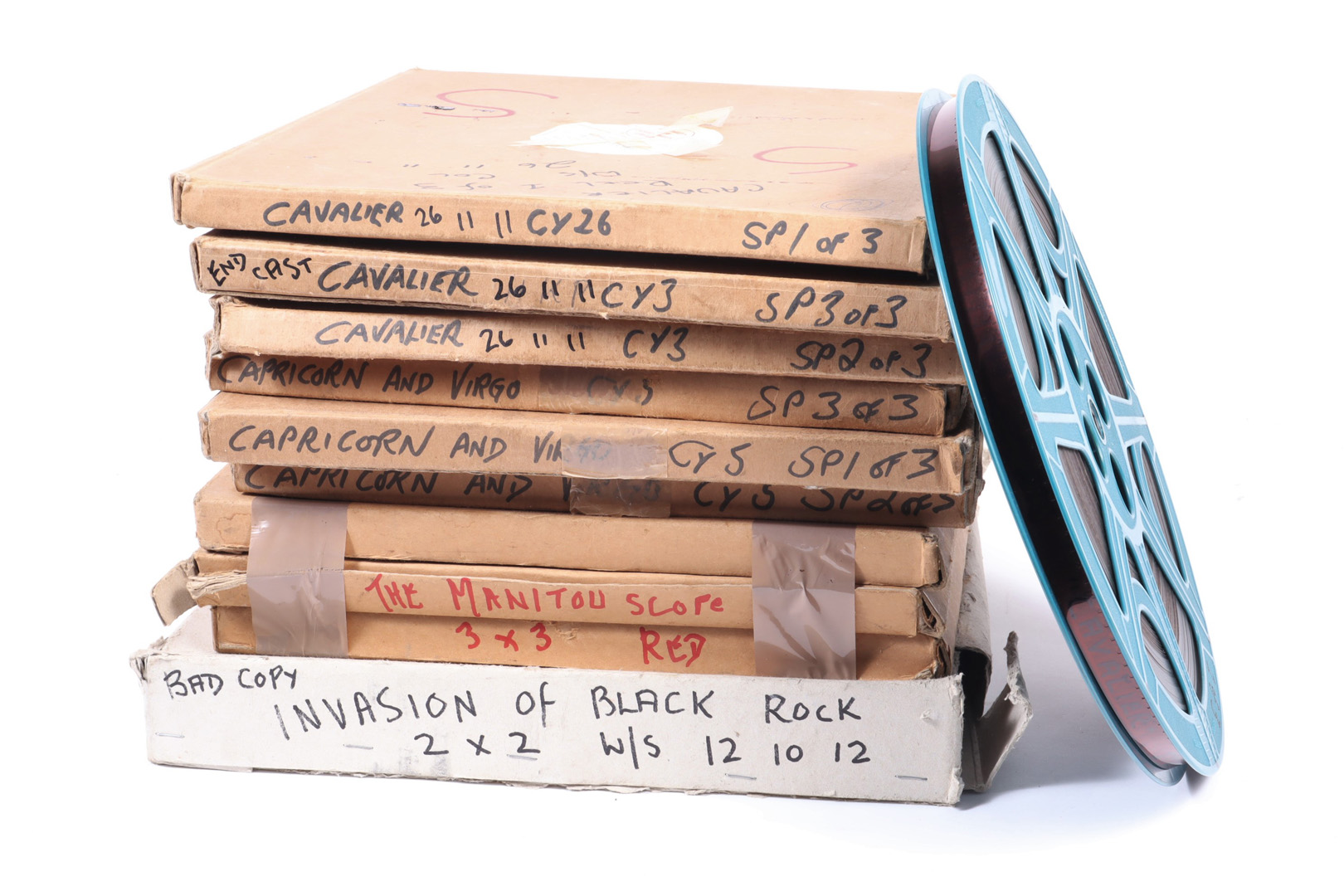Four 16mm Feature Films, in boxes with titles marked, Invasion of Black Rock, The Manitou