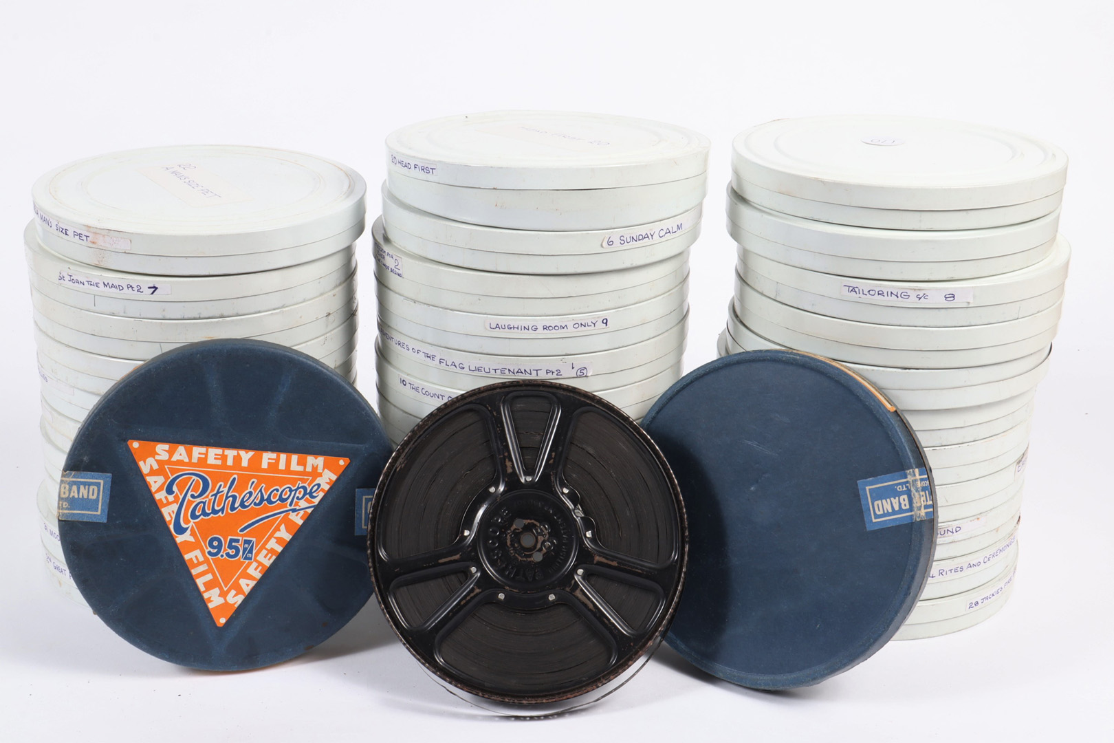 A Quantity of 9.5 Cine Films, in canisters marked with titles, Full Steam Ahead, Walters Day Out,