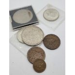 A collection of American coins, including a 1921 Morgan head dollar, another 1971, two half