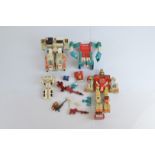 A collection of Hasbro Transformers, including Optimus Prime (white), Fortress Maximus together with