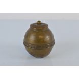 A brass Lipton British Empire Exhibition 1924 tea caddy, 12cm tall