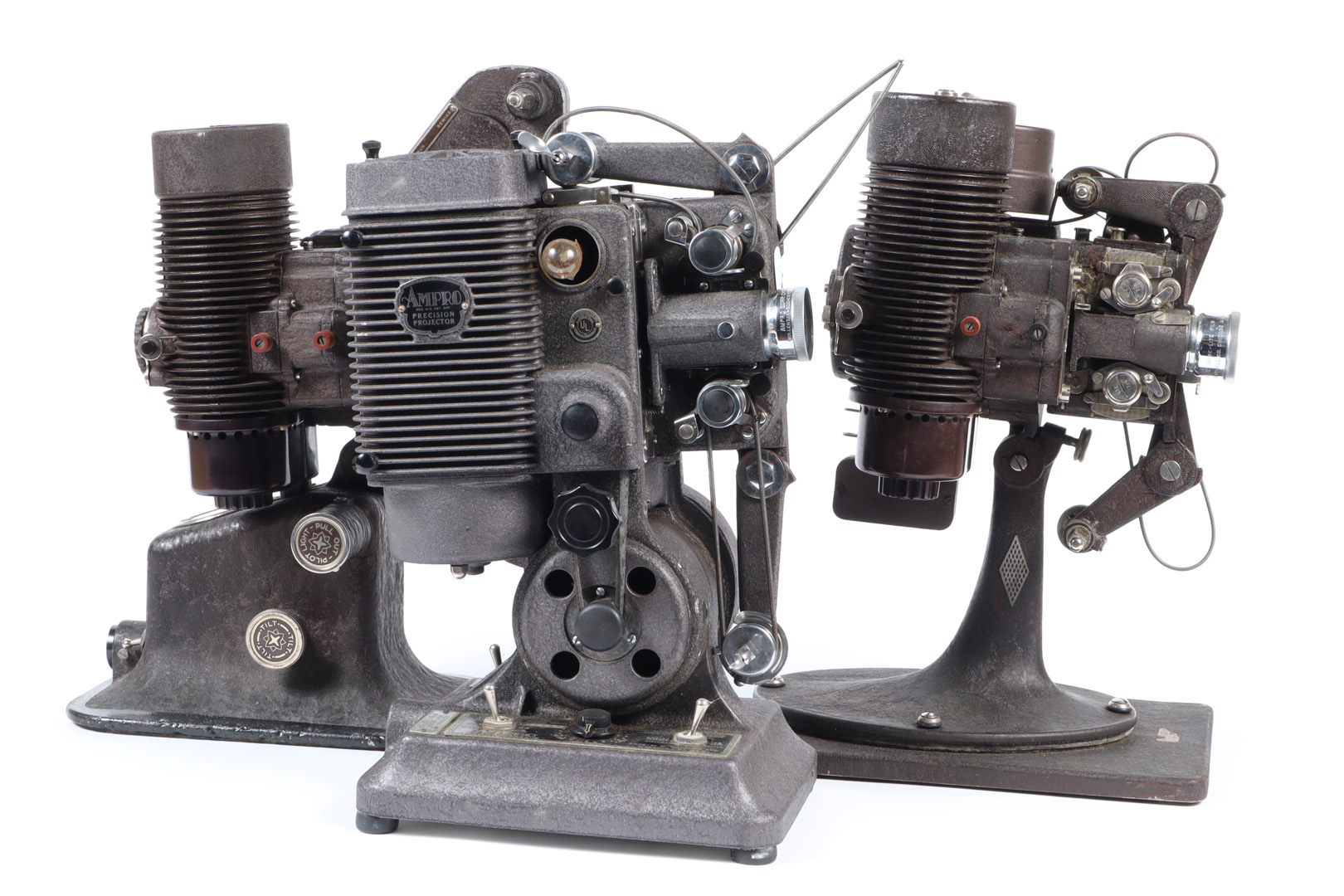 Five United States Vintage 16mm Projectors, comprising three Bell & Howell Filmo 57's, an Ampro KD