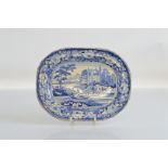 A 19th century Davenport plate, with scenes of three men rowing on a Continental river scene. 27cm x