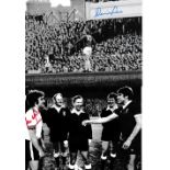 AUTOGRAPHED MAN UNITED PHOTOS Sixteen photos 8" x 6" of former Man United players, all signed in