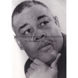 JOE LOUIS PRESS PHOTOGRAPHS Twenty three press photograph, with the majority being black & white, of