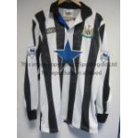 NEWCASTLE UNITED A home black & white long sleeve Asics shirt 1993-1995 with a blue star shirt