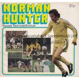 NORMAN HUNTER Autographed testimonial brochure, signed label laid down on the team picture in the
