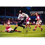 RYAN GIGGS Autographed 12 x 8 colour photo showing Giggs scoring his memorable winning goal