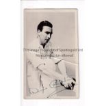 DENIS COMPTON AUTOGRAPH A signed 5.5" X 3.25" b/w promo card, horizontal crease. Generally good